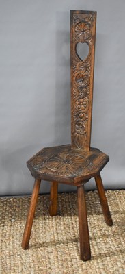 Lot 449 - An oak spinning chair with carved back and...