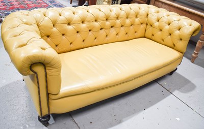 Lot 522 - A modern Chesterfield settee upholstered in...