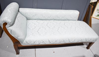 Lot 486 - An antique oak framed chaise lounge newly...