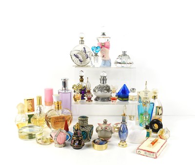 Lot 28 - A group of glass scent bottles and some...
