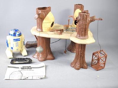 Lot 567 - A vintage Star Wars Ewok village, together...