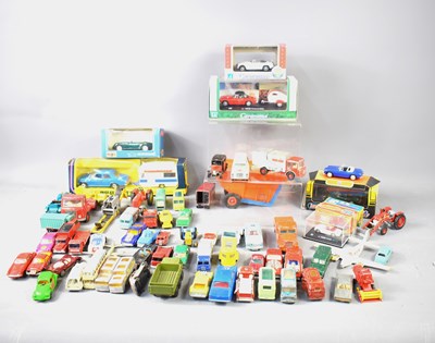 Lot 536 - A group of vintage boxed and unboxed toy cars...