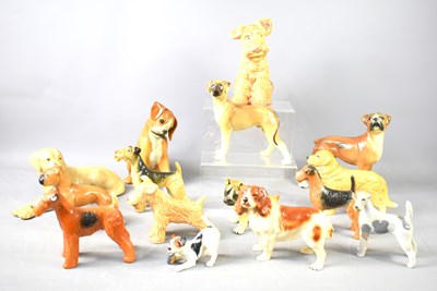 Lot 164 - A group of ceramic dog ornaments to include...