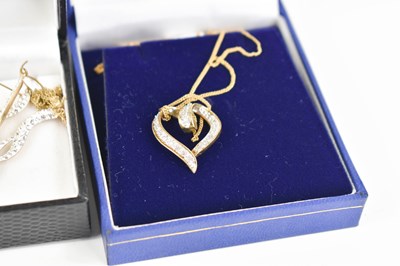 Lot 35 - A 9ct gold heart shaped pendant on a 9ct gold...