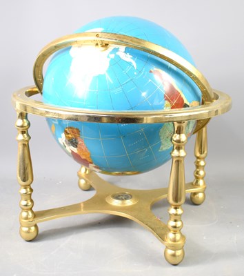 Lot 73 - A world globe inset with various semi precious...