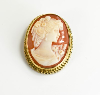 Lot 59 - A 9ct gold set cameo brooch, carved to depict...