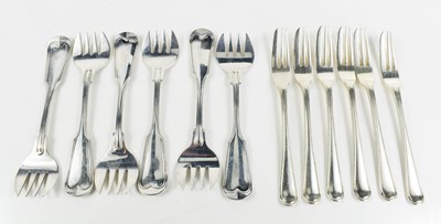 Lot 385 - Two sets of six Dutch 934 silver cake forks, 9....