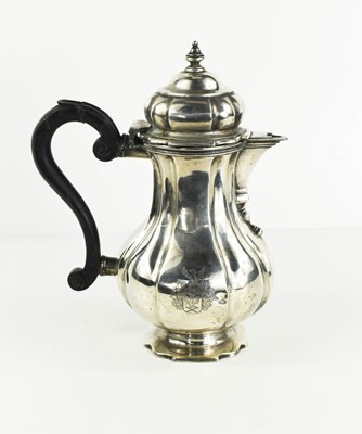 Lot 410 - An 18th century Dutch silver jug, bearing...