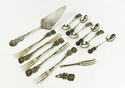 Lot 287 - A part set of Dutch silver cake set,...