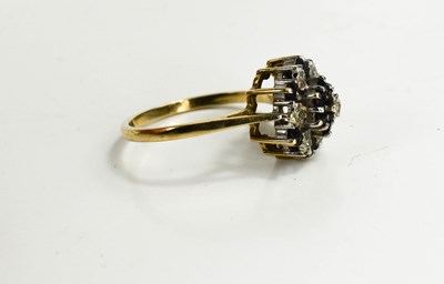 Lot 121 - A 9ct gold, diamond and jet cluster ring, size...