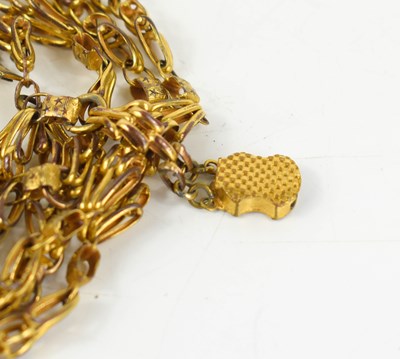 Lot 22 - A gilt metal guard chain of intricate fancy...