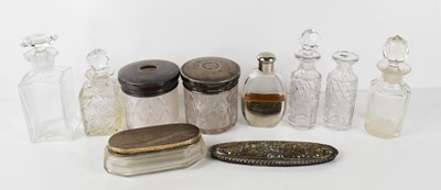 Lot 302 - Three silver and glass dressing table bottles,...