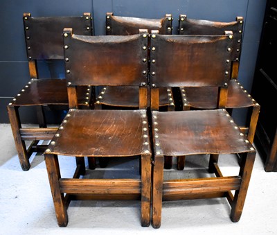 Lot 456 - A set of five oak and leather clad dining...