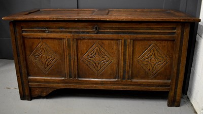 Lot 506 - A 17th century oak coffer, with two panel lid,...