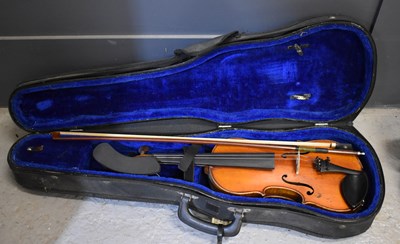 Lot 118 - An antique cased violin and bow.