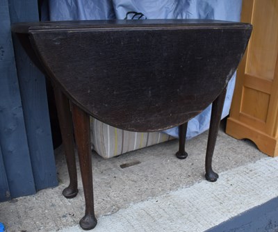 Lot 490 - A large oak gateleg table, 73cm high, 90cm...