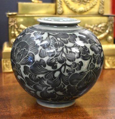 Lot 201 - A Japanese vase, in celadon glaze, with green...