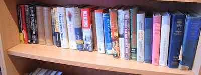 Lot 252 - A quantity of vintage and newer hardback books...