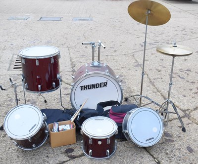 Lot 543 - A "Thunder" drum kit together with a set of...