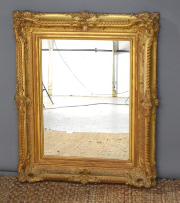 Lot 423 - A late Victorian carved giltwood frame with...