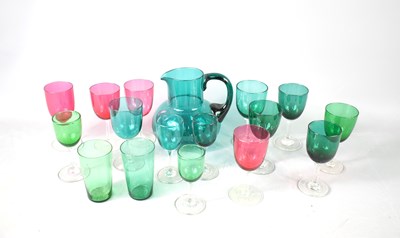 Lot 156 - A group of green and cranberry glasses,...