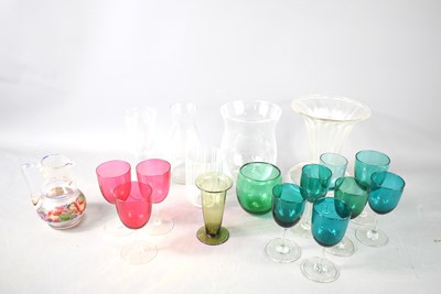 Lot 158 - A group of green and cranberry glasses, along...