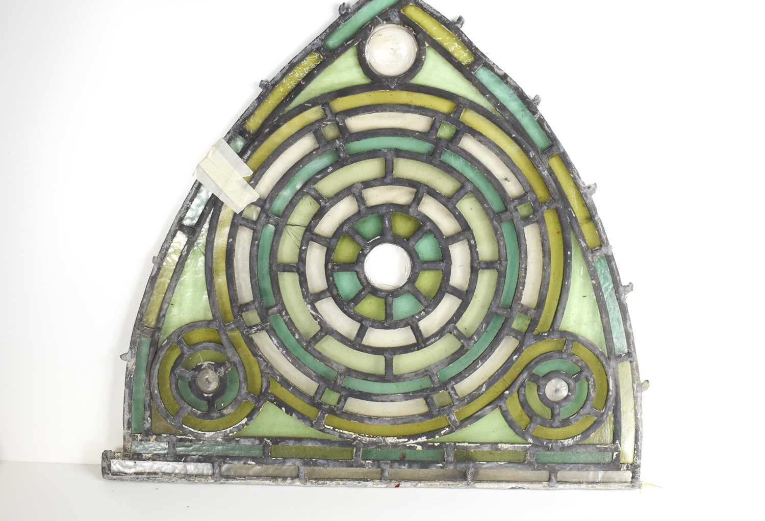 Lot 19 - An antique stained glass window in different...