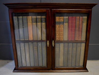 Lot 514 - A small 19th century cabinet with glazed doors...