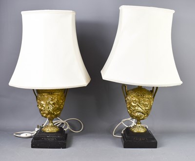 Lot 20 - A pair of 19th century gilt metal table lamps,...
