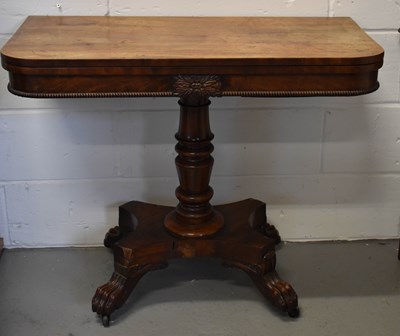 Lot 489 - A 19th century rosewood tea table with folding...