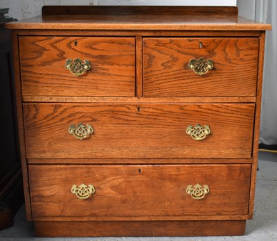 Lot 476 - An antique elm chest of drawers, two deep over...