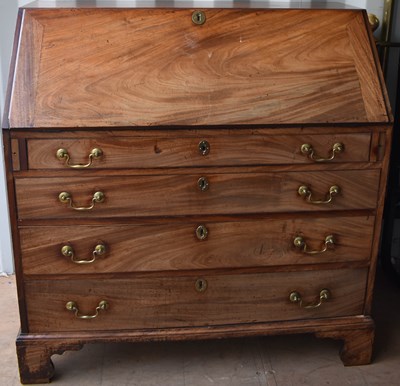 Lot 499 - A 19th century Georgian mahogany bureau with...