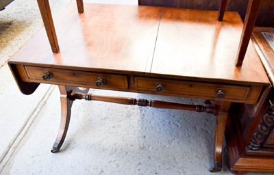 Lot 468 - A mahogany sofa table with two slim drawers,...