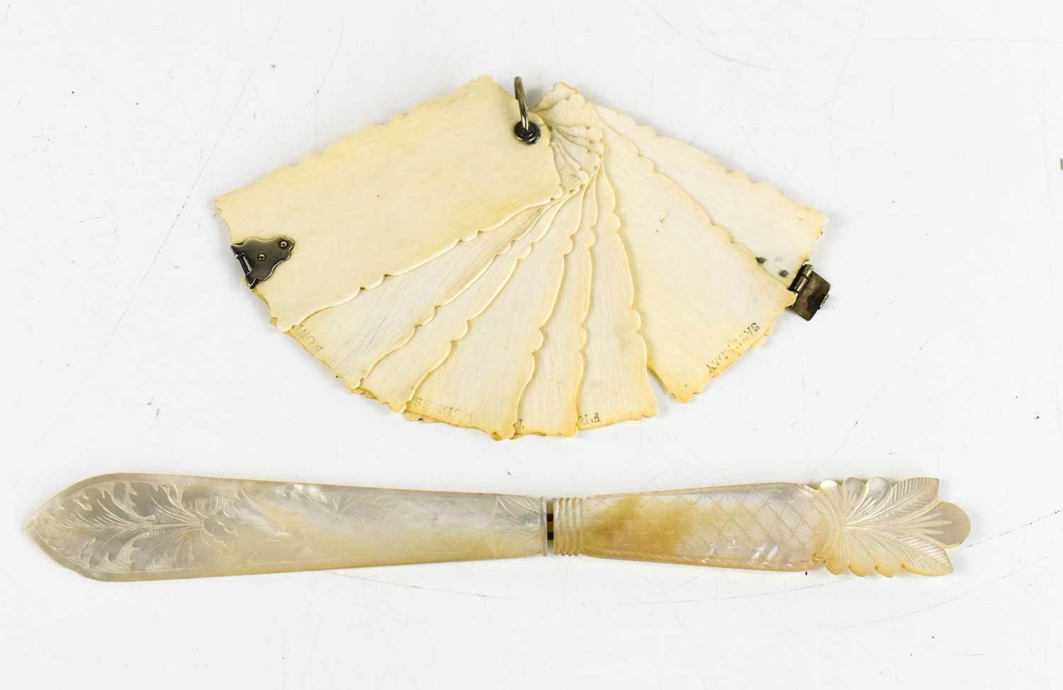 Lot 315 - A Victorian bone carved aide memoire, engraved...