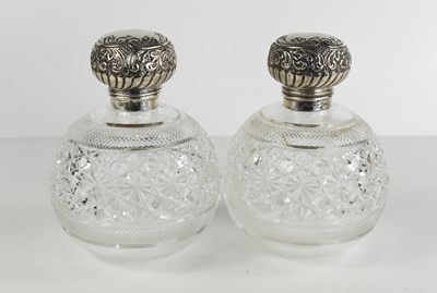 Lot 339 - A pair of silver and glass Walker & Hall scent...