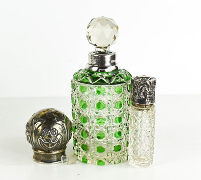 Lot 330 - A silver and cut glass scent bottle with green...