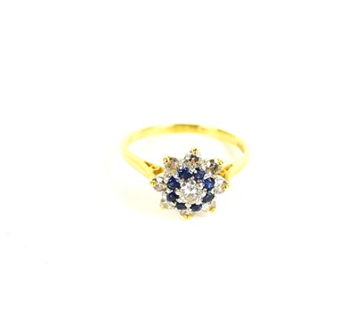 Lot 151 - An 18ct gold, platinum, diamond and sapphire...