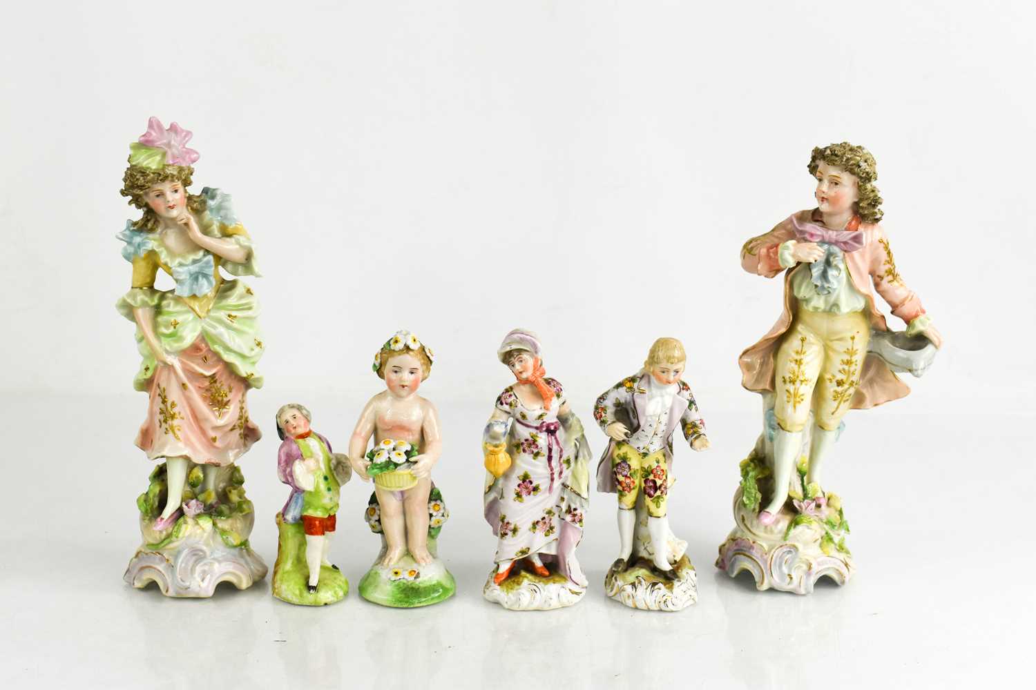 Lot 172 - Two pairs of German porcelain figurines and...