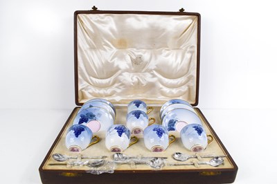 Lot 130 - A fine Royal Worcester set of coffee cans and...