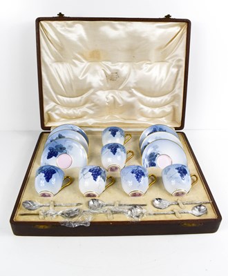 Lot 130 - A fine Royal Worcester set of coffee cans and...