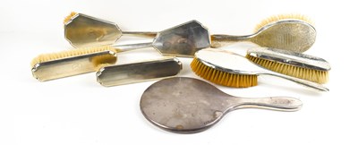 Lot 320 - A set of four silver dressing table brushes,...