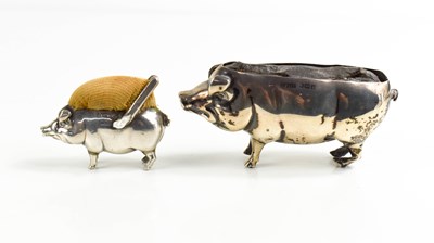 Lot 322 - Two silver pin cushions in the form of pigs,...