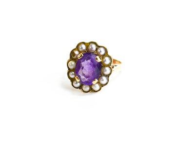Lot 37 - A 9ct gold, amethyst and seed pearl ring, the...