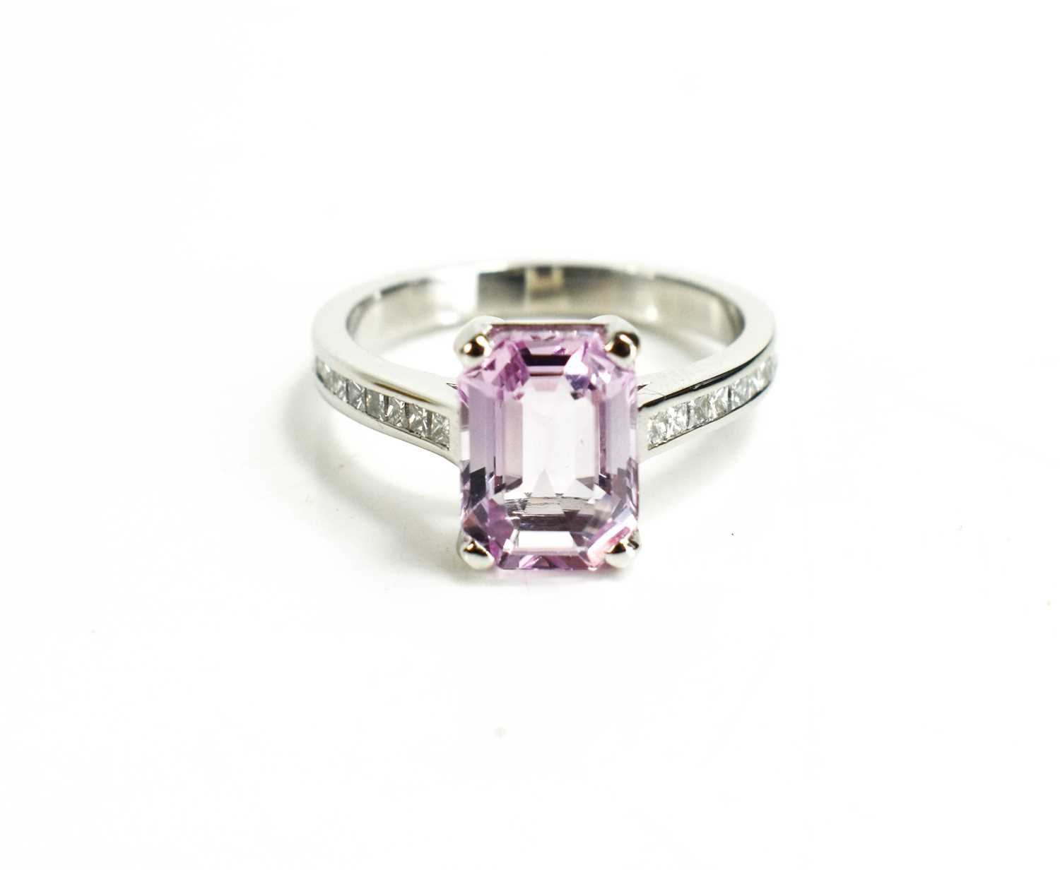 Lot 53 - A platinum, pink topaz and diamond ring, the...