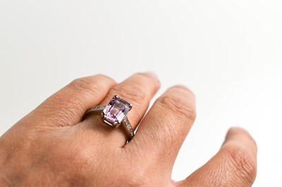 Lot 53 - A platinum, pink topaz and diamond ring, the...