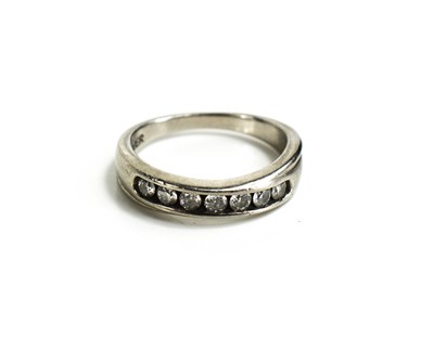 Lot 137 - A palladium and diamond half hoop eternity...