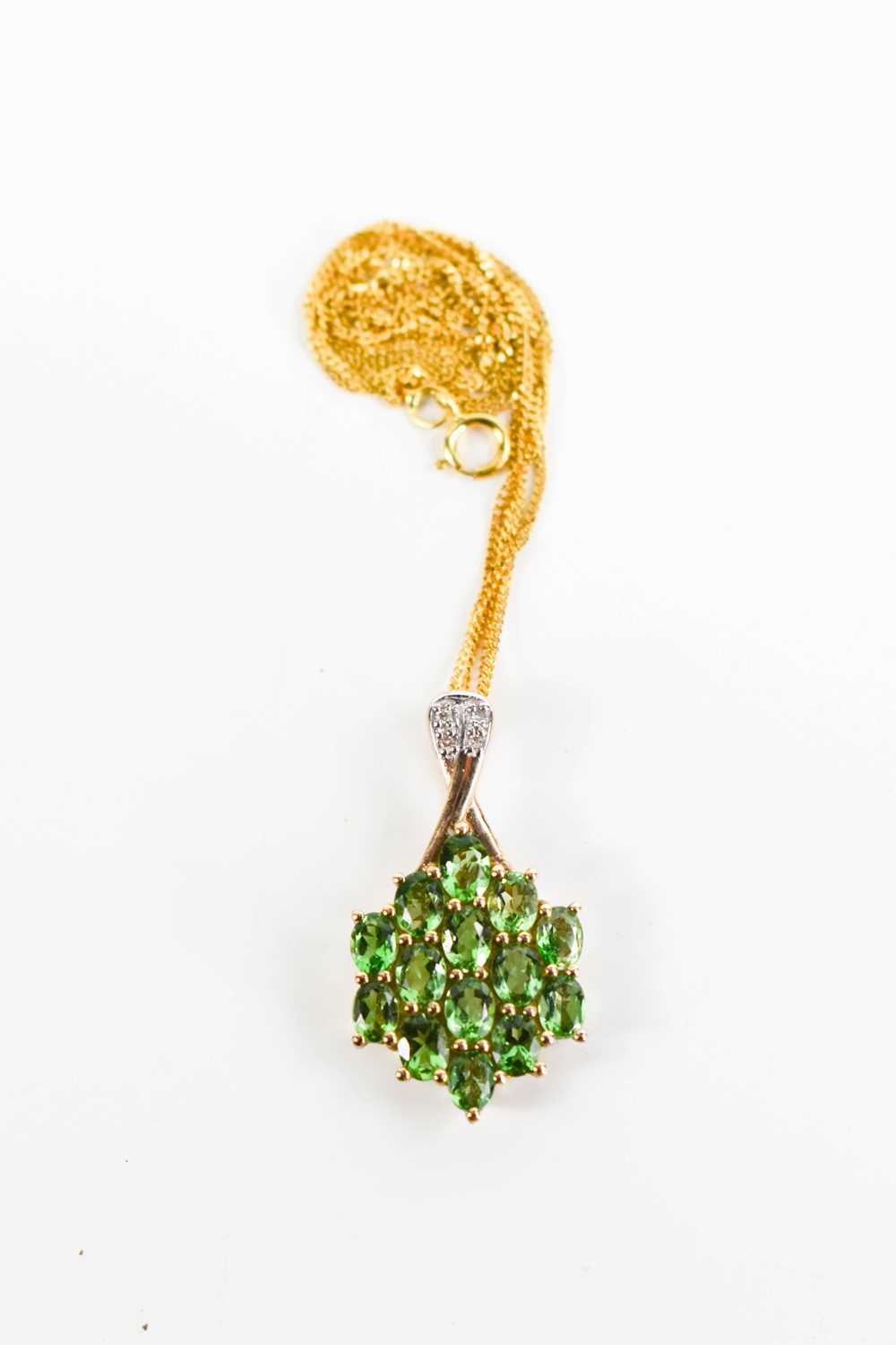 Lot 75 - A 9ct gold necklace, with a 9ct gold, green...