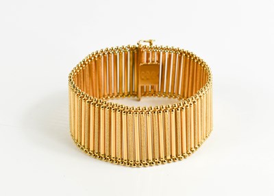 Lot 54 - An 18ct gold bar link bracelet, plain links...