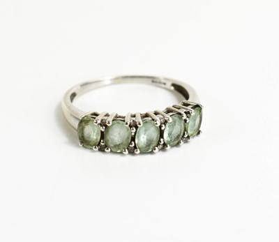 Lot 33 - A 9ct white gold and prasiolite five stone...