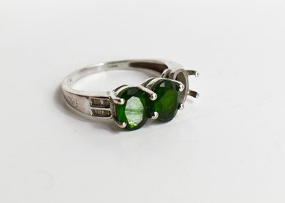 Lot 73 - A 9ct white gold and green tourmaline ring...